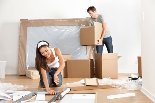Removal team planning a home move on a Fulham residential street