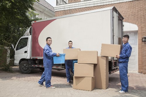 Professional piano removals in Fulham with protective wrapping