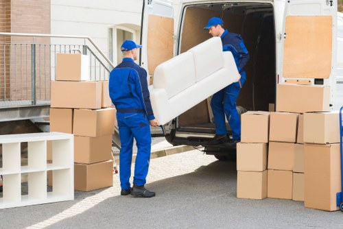 Removal Company Fulham team sorting recyclable items during a clearance