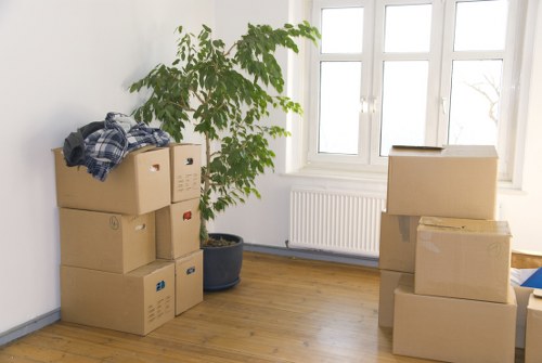 Carefully labelled moving boxes ready for transport from a Fulham property