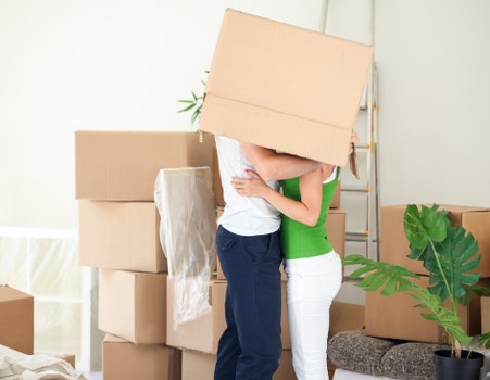 Professional movers handling packed belongings in Fulham