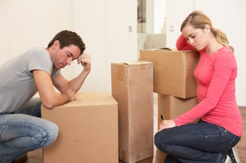 Professional movers packing household items for a Fulham relocation