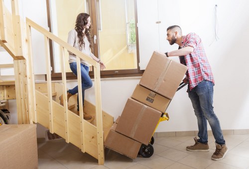 Packing and loading boxes into a moving truck in Fulham