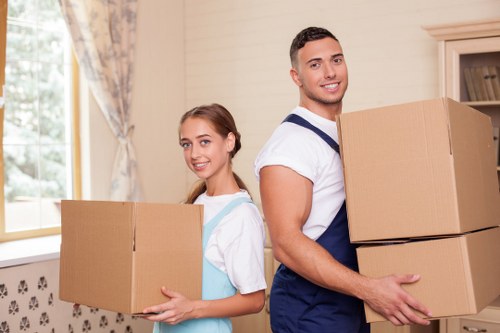 Local removal team transporting furniture in Fulham