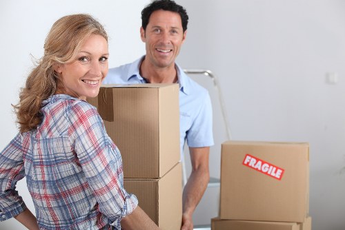 Local moving team organizing items during a removal in Fulham
