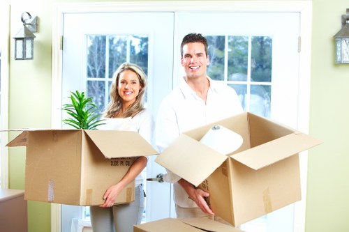 Team handling desks and equipment in a Fulham office move